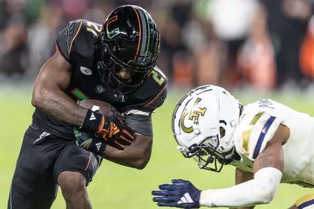 henry-parrish-jr-21-of-the-miami-hurricanes-running-the-ball-during-the-second-half-against884486