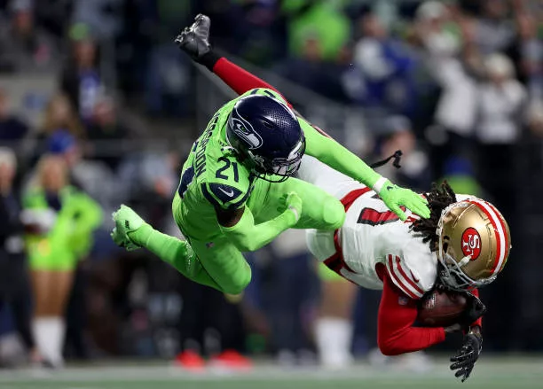 seattle-washington-brandon-aiyuk-of-the-san-francisco-49ers-scores-a-touchdown-as-devon627373