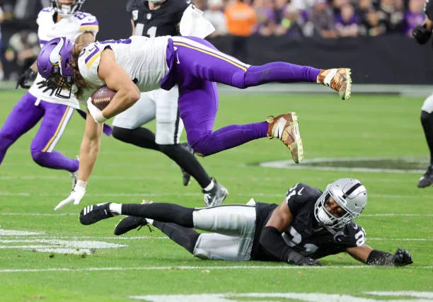 las-vegas-nevada-tight-end-t-j-hockenson-of-the-minnesota-vikings-is-tripped-up-after-a-catch718156