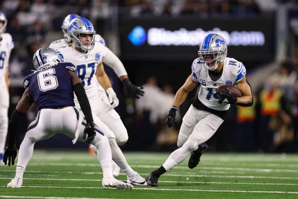 arlington-tx-amon-ra-st-brown-of-the-detroit-lions-runs-with-the-ball-during-an-nfl-football97276