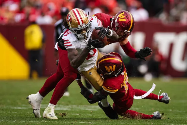 landover-md-brandon-aiyuk-of-the-san-francisco-49ers-runs-with-the-ball-against-cody-barton761472