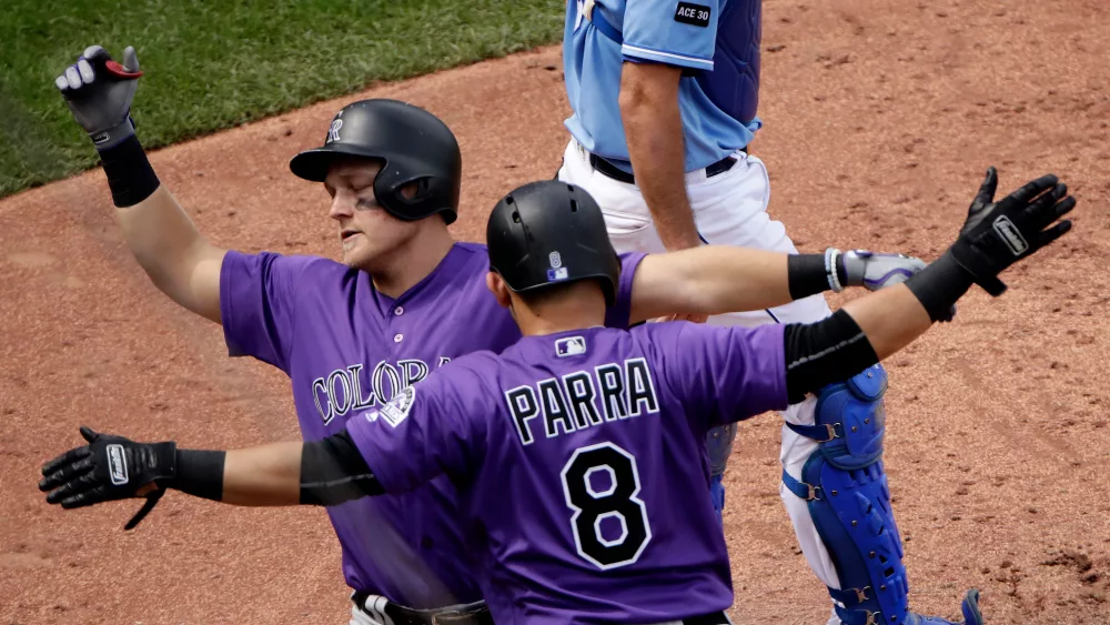 0e0ba38b-pi-mlb-rockies-pat-valaika-gerardo-parra-082417750914