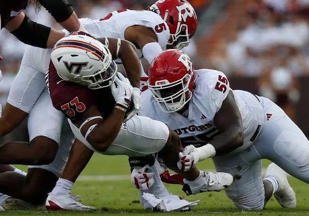 blacksburg-va-rutgers-scarlet-knights-defensive-lineman-zaire-angoy-and-defensive-back-kaj460994