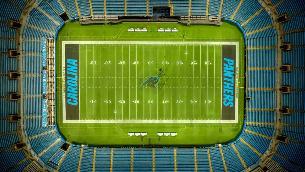 Night aerial view of the Bank of America Stadium^ home of the National Football League Carolina Panthers and MLS Charlotte FC football club.