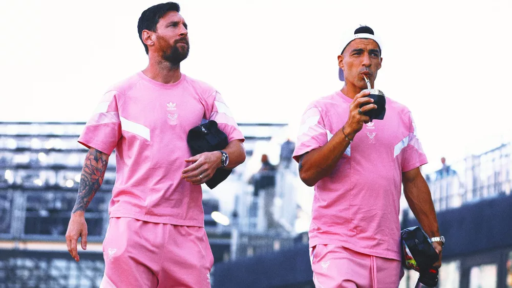 suarezmessimain403615