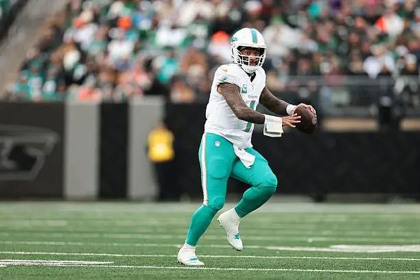 east-rutherford-new-jersey-tua-tagovailoa-of-the-miami-dolphins-runs-with-the-football-during60141