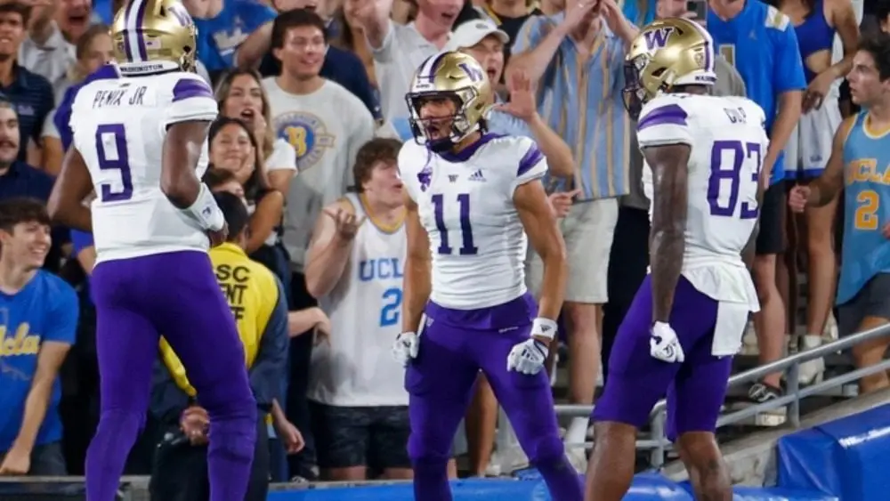 Washington's Jalen McMillan (11) against the UCLA during NCAA college football game Friday^ Sept. 30^ 2022^ in Pasadena^ Calif.