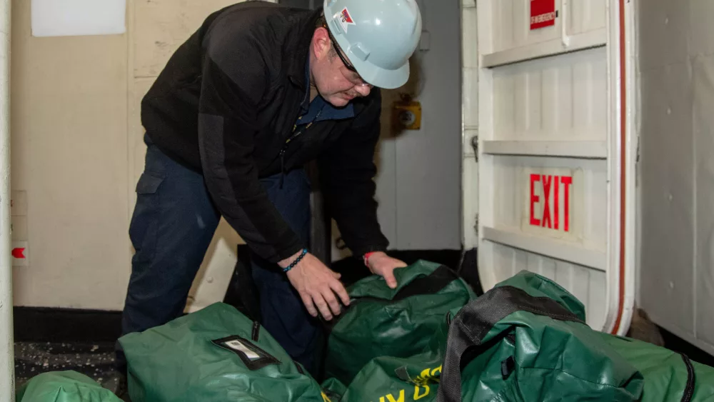 uss-ronald-reagan-cvn-76-sailor-transports-cbr-equipment