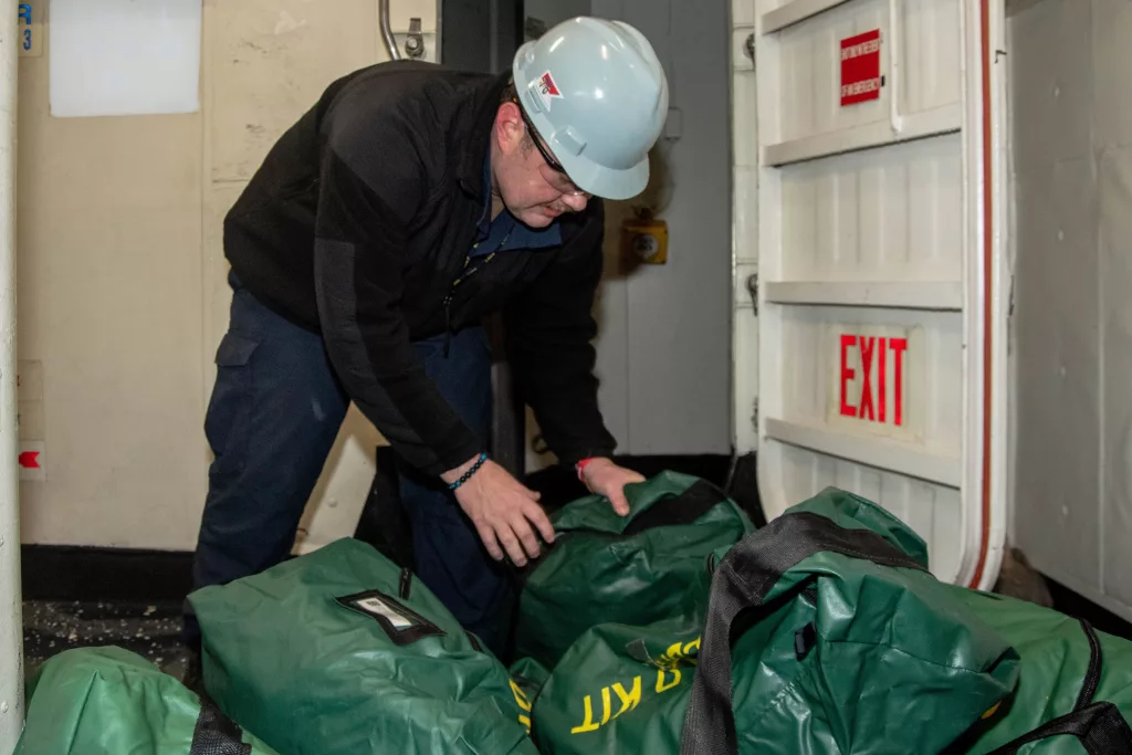 uss-ronald-reagan-cvn-76-sailor-transports-cbr-equipment