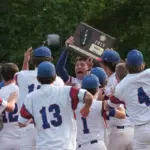 20250602-1abaseball-super-01: Pawnee players celebrate with the Super-sectional trophy after defeating Waltonville-Sesser-Valier 5-4 iat Itchy Jones Stadium in Carbondale on Monday.