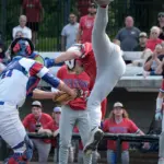 20250602-1abaseball-super-07: Waltonville-Sesser-Valier’s Liam McMurray (1) is tagged out by Pawnee catcher Carson Wort (11) while trying to score in the third inning during the 1A baseball super-sectional at Itchy Jones Stadium in Carbondale on Monday. Pawnee came back to win 5-4.