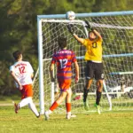 Massac County sophomore goalkeeper Arai Crim-Olds (0) makes a nice jumping catch save against Murphysboro to keep the game tied 1-1 late in the 2nd half. Photo by Hunter Whitecotton/Southern Focus Photography