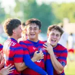 Massac County senior Joseph Gomez celebrates with his teammates after scoring the tying goal against Murphysboro on senior day. Photo by Hunter Whitecotton/Southern Focus Photography