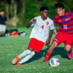 Murphysboro junior Jeremiah Vaughn battles against Massac County senior Joseph Gomez. Photo by Hunter Whitecotton/Southern Focus Photography