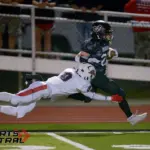 Johnston City's Jace Weaver (22) picks up big yardage as Fairfield’s Austin Grieve (9) makes the tackle during the first quarter on Friday, Oct. 3, in Johnston City. Photo by Byron Hetzler