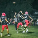 West Frankfort's Lucas Parker (#8) and Jase Bennett (#21) go up for a pass intended for a Du Quoin receiver. Parker would intercept the pass late in the second quarter. Photo by Hunter Whitecotton/Southern Focus Photography