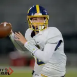 Marion quarterback Callahan Roper (2) passes as he warms up prior to the Wildcats’ game against Carbondale on Friday, Oct. 17, in Carbondale.