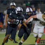 Carbondale’s Savion Thomas-Mims (10) looks for running room during the second quarter against Marion on Friday, Oct. 17, in Carbondale.