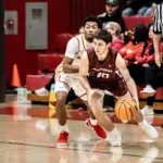 Benton’s Clay Gage drives defended by Murphysboro's DaeJohn Beard (Photo by Hunter Whitecotton/Southern Focus Photography)