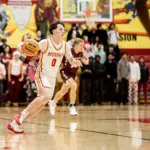 Murphysboro's Cash Brooks drives past half court. (Photo by Hunter Whitecotton/Southern Focus Photography)