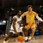 SIU senior Damien Mayo Jr. (10) drives to the basket against Valparaiso. Photo by Hunter Whitecotton/Southern Focus Photography
