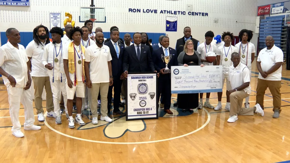 the-international-longshoreman-association-local-1414-presents-the-savannah-high-state-champion-basketball-team-with-a-check-to-fund-their-championship-rings-6812de455f5e9829772