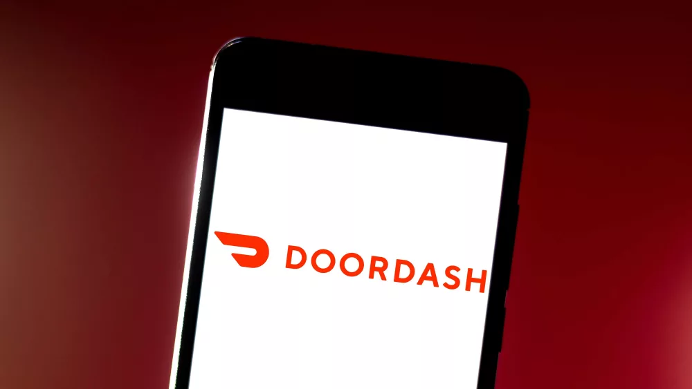 in-this-photo-illustration-the-doordash-logo-is-seen-news-photo-1569598525161555