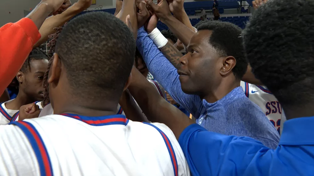 savannah-state-interim-head-coach-clevan-thompson-leads-team-huddle-after-victory-over-morehouse-677f527502e78791728
