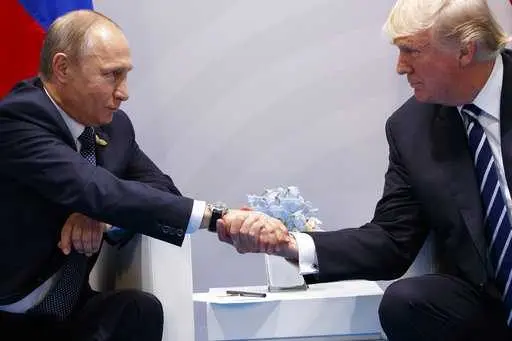trump-putin-g20-handshake-apimages-1499439809208750