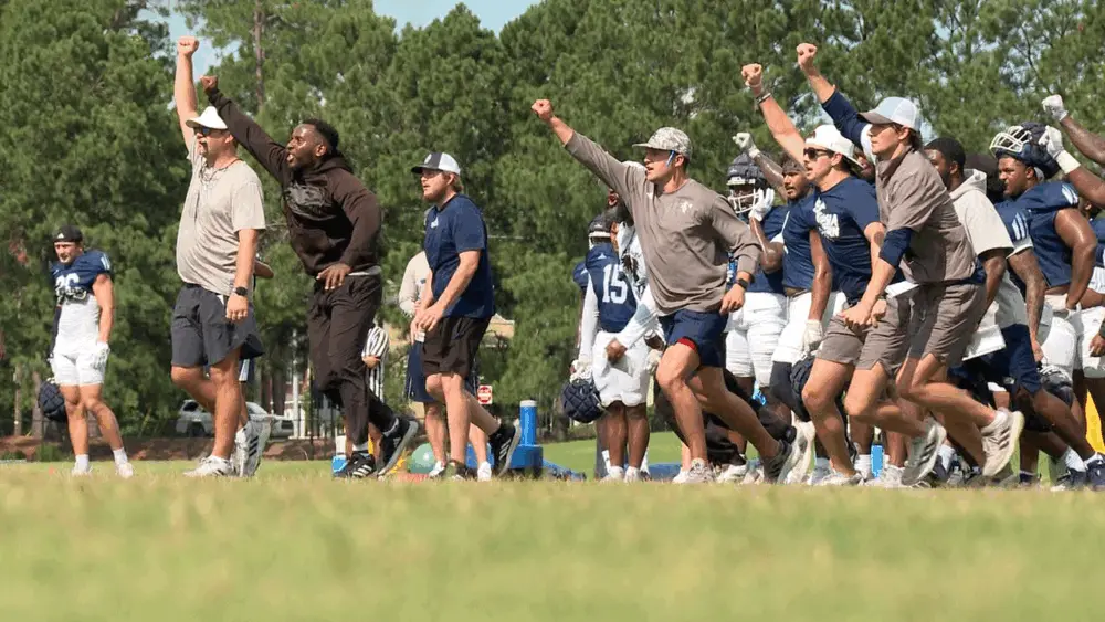 the-georgia-southern-defensive-staff-celebrates-after-a-4th-and-goal-stop-in-practice-689be041c8c46963028