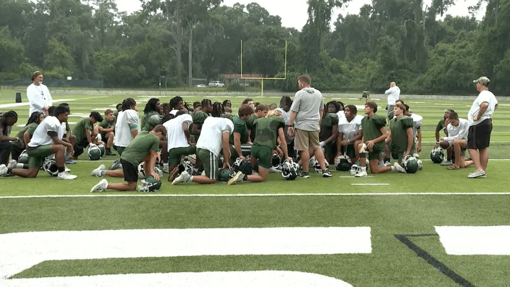 beaufort-football-head-coach-bryce-lybrand-addresses-his-team-at-practice-68abd84e7cb58239159