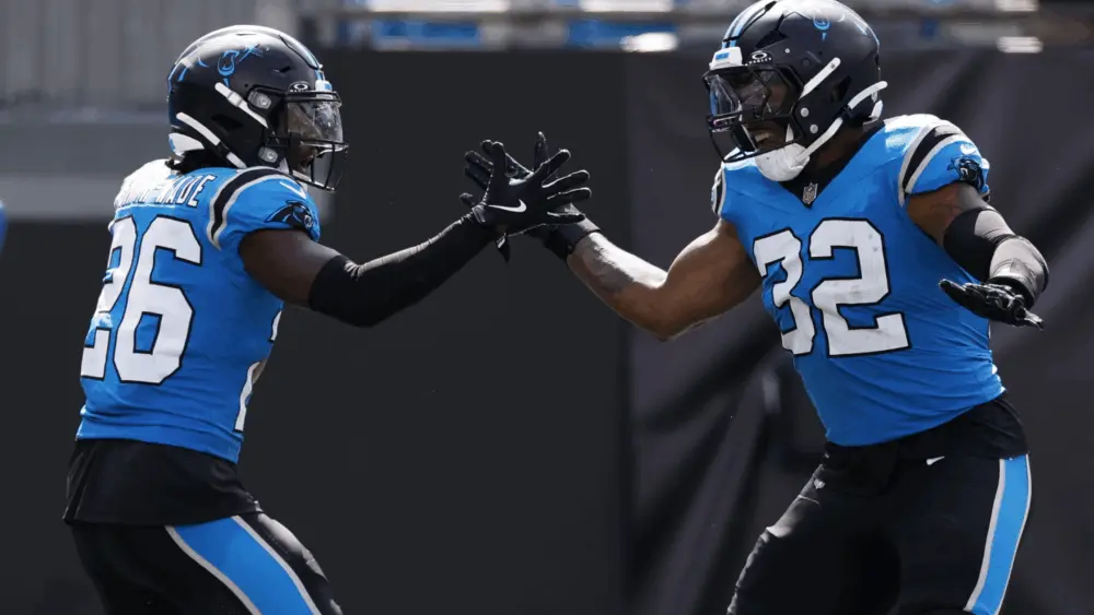 carolina-pantheres-cornerback-chau-smith-wade-celebrates-after-scoring-an-interception-with-linebacker-trevin-wallace-68d0849f68272152879