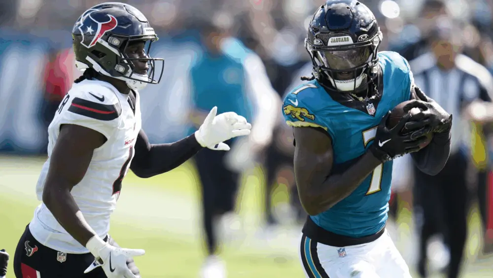 jacksonville-jaguars-wide-receiver-brian-thomas-kr-holds-the-ball-after-making-a-catch-against-the-houston-texans-68d085aa518aa715486