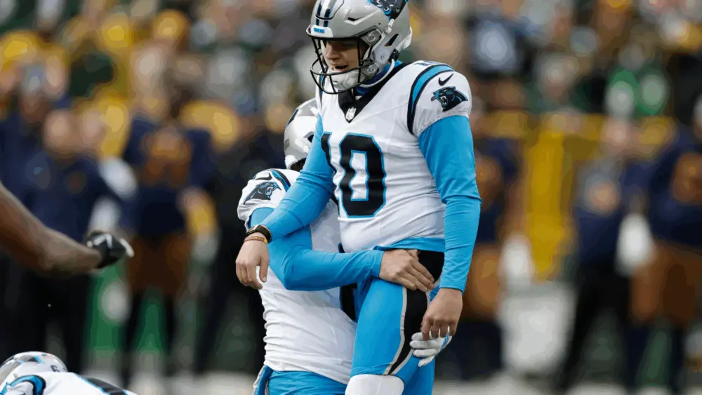 carolina-panthers-punter-sam-martin-celebrates-with-placekicker-ryan-fitzgerald-after-fitzgerald-s-winning-field-goal-against-green-bay-6907ed5065a53583811