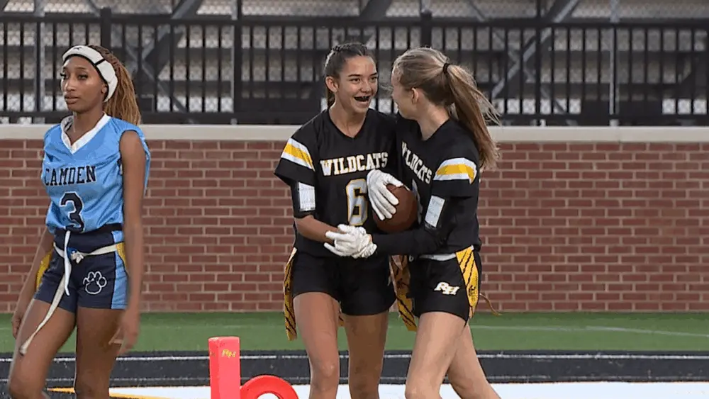 richmond-hill-flag-football-players-tailah-christman-and-victoria-wallace-celebrate-after-scoring-a-touchdown-against-camden-county-6916a45f7fbbb714198