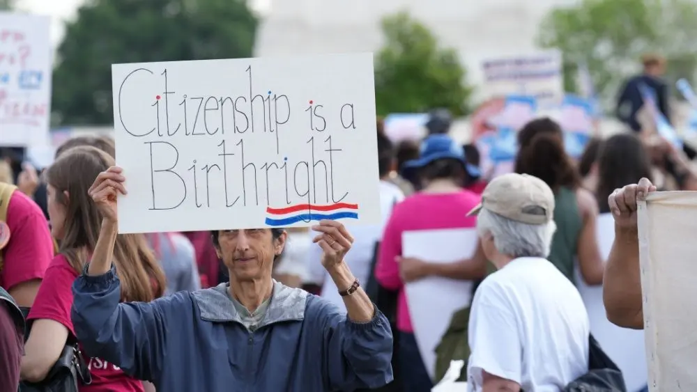Several hundred protesters rally at the Supreme Court against president Trump's illegal executive order to make birthright citizenship conditional. Washington^ DC – May 15^ 2025