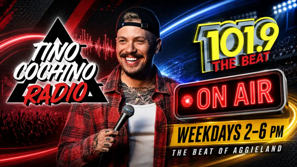 The Tino Cochino graphic for the rotating slider. Tino is standing in the middle of a black/neon red and blue background holding a microphone.