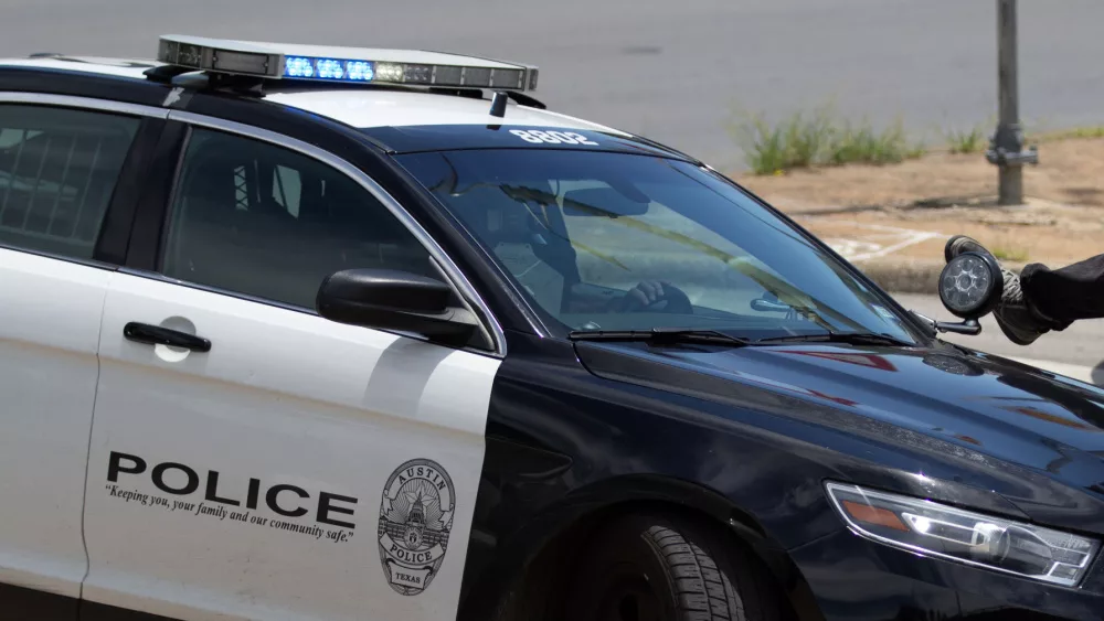 Austin^ Texas^ a police car in the street. May 30th 2020