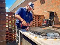 Cool Breeze H&C owner Court Van Scyoc at work