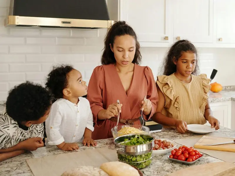 African American family preparing a healthy meal