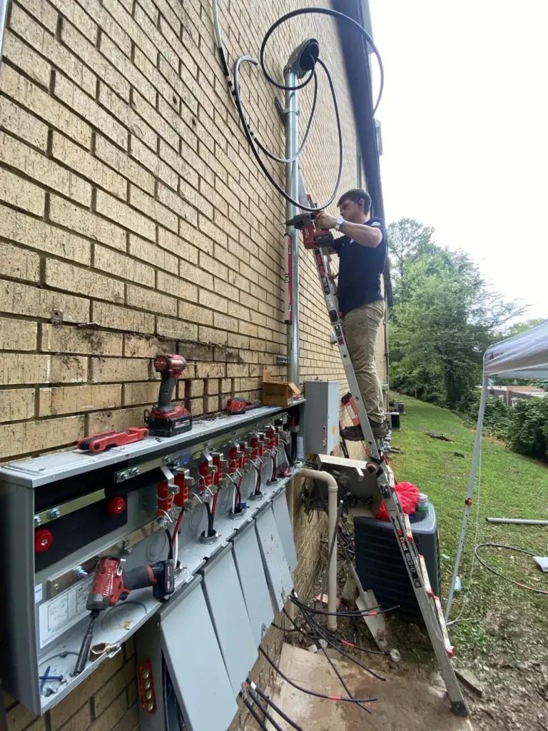 Dillion, an Electrum technician, working on a job site