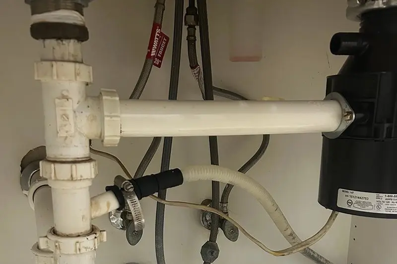 Benchmark Plumbing kitchen sink drain after