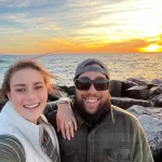 The Happy Couple: Taken on our engagement night while watching the sunset over Lake Michigan 