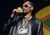 Snoop Dogg performs at the 2017 New Orleans Jazz and Heritage Festival. New Orleans^ Louisiana - April 28^ 2017