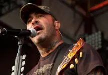 Aaron Lewis plays his guitar druing the performance of Staind Rockstar Uproar Festival on September 25^ 2012 in Nampa^ Idaho.