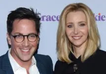 Dan Bucatinsky and Lisa Kudrow arrives for the "Grace and Frankie" Season 4 Premiere on January 18^ 2018 in Palm Springs^ CA