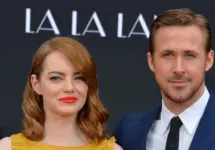 LOS ANGELES^ CA - DECEMBER 7^ 2016: Actors Emma Stone & Ryan Gosling at the TCL Chinese Theatre^ Hollywood^ where the stars of La La Land had their hand & footprints set in cement.