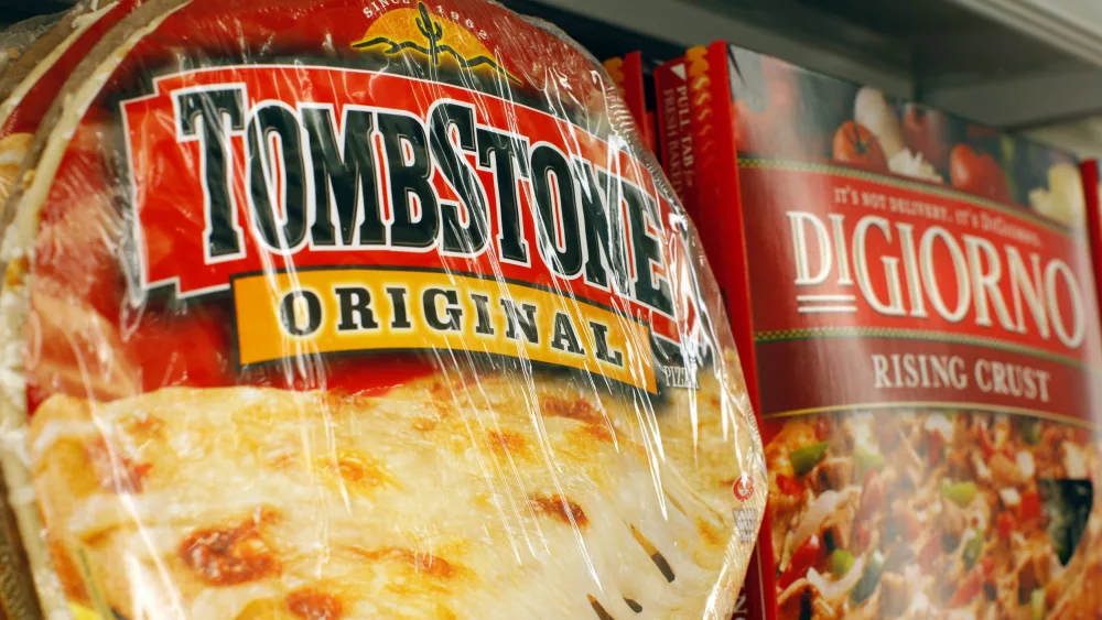 tombstone-and-digiorno-brand-frozen-pizzas-owned-by-kraft-sit-in-the-frozen-foods-section-of-a-shaws-supermarket-in-medford