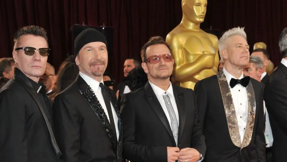 U2 with Bono & The Edge at the 86th Annual Academy Awards at the Hollywood & Highland Theatre^ Hollywood. LOS ANGELES^ CA - MARCH 2^ 2014