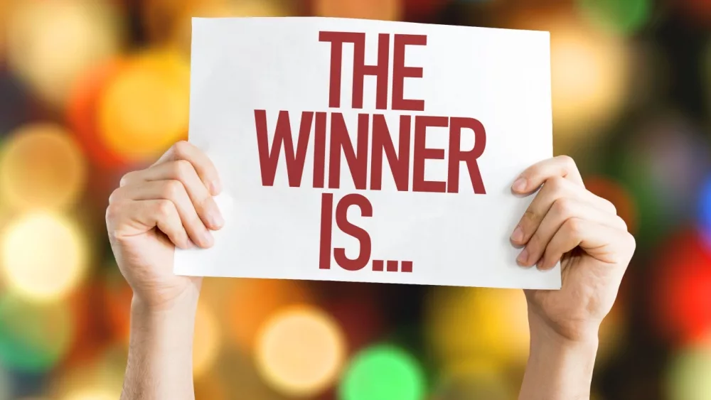 the winner is sign